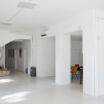 Spacious contemporary apartment with minimalist design and bright natural light.
